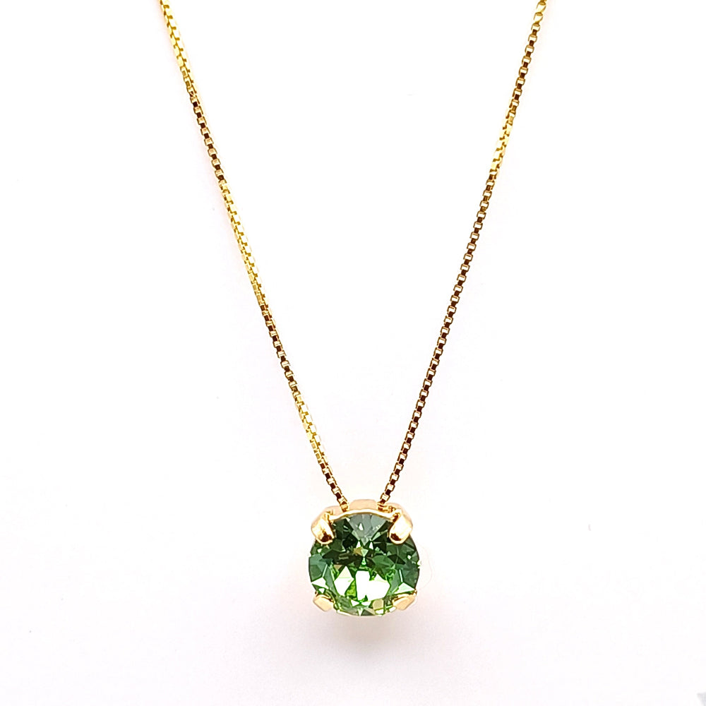 Collana dorata con ciondolo in cristallo verde - ungioielloperte