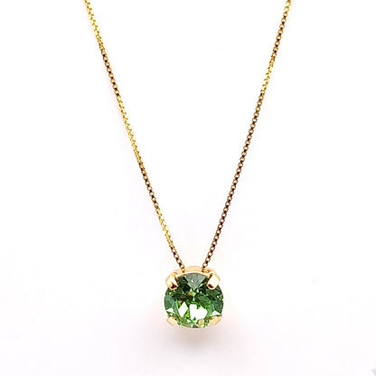 Collana dorata con ciondolo in cristallo verde - ungioielloperte