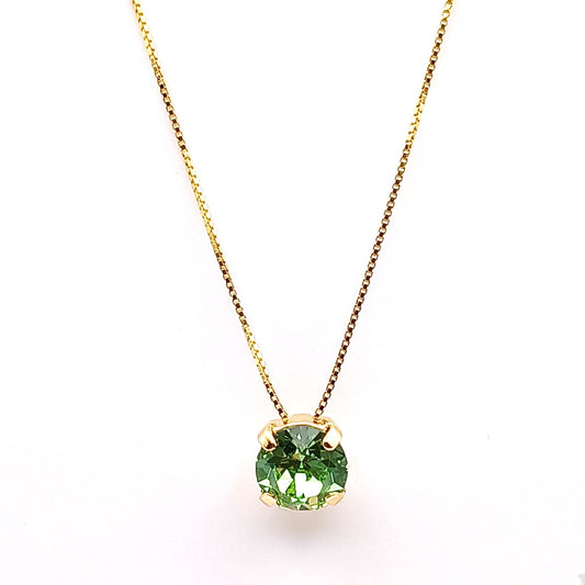 Collana dorata con ciondolo in cristallo verde - ungioielloperte